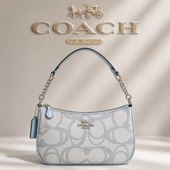 Coach Signature Mini Shoulder Bag – Elegant, Versatile & Timeless