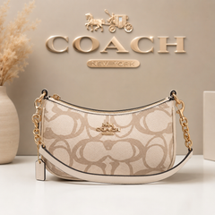 Coach Signature Mini Shoulder Bag – Elegant, Versatile & Timeless