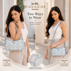 Coach Signature Mini Shoulder Bag – Elegant, Versatile & Timeless